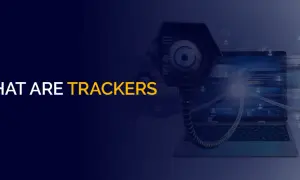 Co to trackery? Dwie kamery przypominające oczy obserwują laptop z kodem. Symbolizują śledzenie danych.