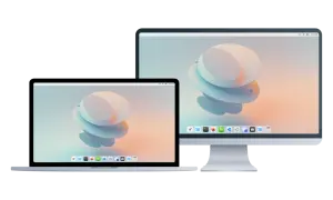 Laptop i monitor z tapetą w stylu cutefish os.