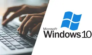 Dłonie piszą na klawiaturze laptopa obok logo Windows 10. Dowiedz się, windows 10 do kiedy wsparcie.