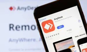 Aplikacja AnyDesk na telefonie, pokazująca jej sklep z aplikacjami. Dowiedz się, anydesk co to jest i jak działa zdalny pulpit.