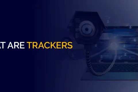 Co to trackery? Dwie kamery przypominające oczy obserwują laptop z kodem. Symbolizują śledzenie danych.