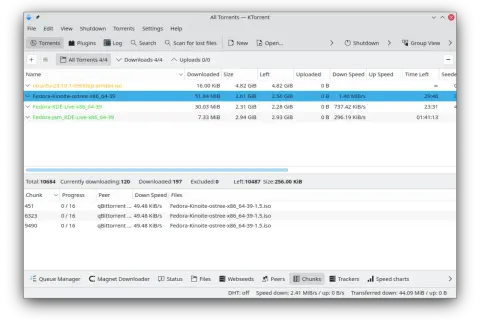 Widok programu KTorrent z listą pobieranych plików, w tym Fedora-Kinoite-ostree-x86_64-39.
