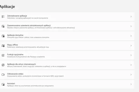 Menu "Aplikacje" z opcją "Autostart" do zarządzania programami uruchamianymi po zalogowaniu.