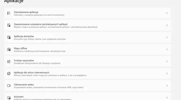 Menu "Aplikacje" z opcją "Autostart" do zarządzania programami uruchamianymi po zalogowaniu.