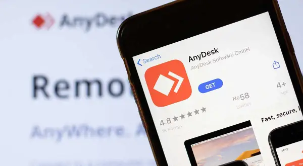 Aplikacja AnyDesk na telefonie, pokazująca jej sklep z aplikacjami. Dowiedz się, anydesk co to jest i jak działa zdalny pulpit.
