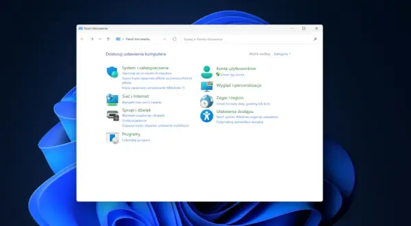 Panel sterowania z kategoriami: System i zabezpieczenia, Sieć i Internet, Sprzęt i dźwięk, Programy, Konta użytkowników, Wygląd i personalizacja, Zegar i region, Ułatwienia dostępu.