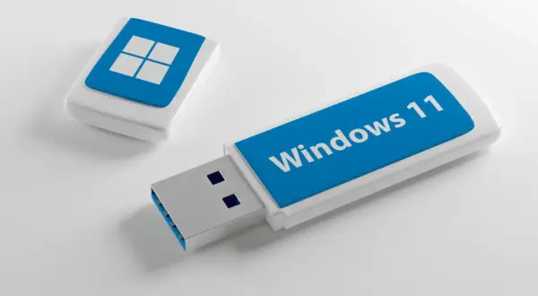 Pendrive z logo Windows 11, gotowy do pomocy w tym, jak zainstalować system operacyjny na pendrive.