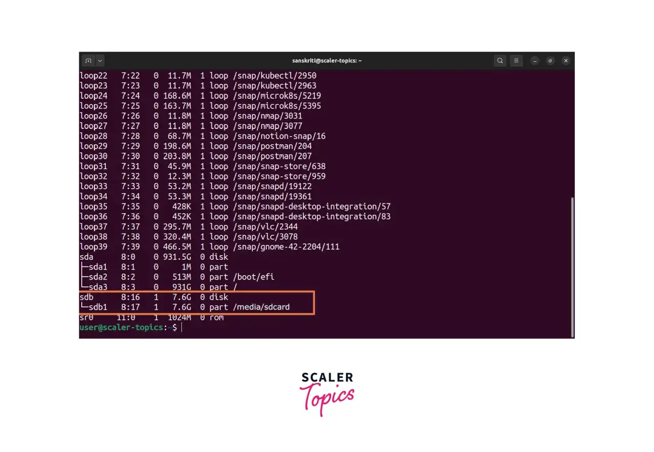 Terminal z listą urządzeń, w tym formatowanie karty SD (sdb1 7.6G /media/sdcard).