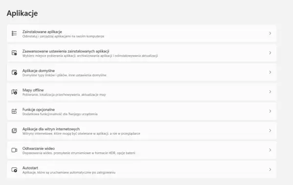 Menu "Aplikacje" z opcją "Autostart" do zarządzania programami uruchamianymi po zalogowaniu.