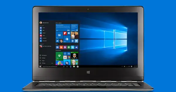 Laptop z systemem Windows 10. Menu Start otwarte, widoczne kafelki z aplikacjami. Obrazek może pomóc w znalezieniu informacji, jak wyłączyć Windows Defender.
