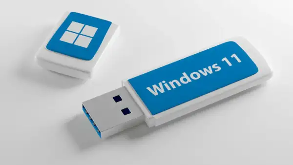 Pendrive z logo Windows 11, gotowy do pomocy w tym, jak zainstalować system operacyjny na pendrive.
